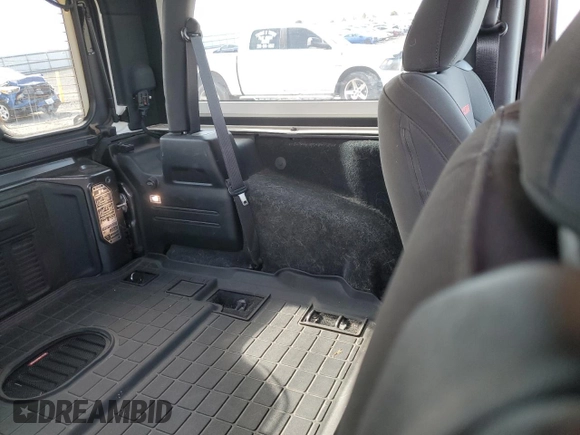2023 Jeep Wrangler Rubicon with VIN 1C4HJXCG5PW652704, listed as a Copart auction lot 59762475 with 19,924 mi miles and Salvage title. Bid and sale history available at DreamBid. Image 11.