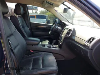 2013 Jeep Grand Cherokee Laredo with VIN 1C4RJEAG9DC621061, listed as a IAAI auction lot 41846537 with 107,264 mi miles. Bid and sale history available at carsss.com. Image 5.