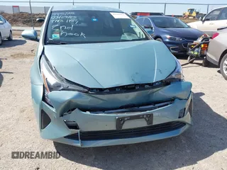 2018 Toyota Prius Two with VIN JTDKBRFU3J3068729, listed as a IAAI auction lot 41989450 with 192,848 mi miles and . Bid and sale history available at DreamBid. Image 12.