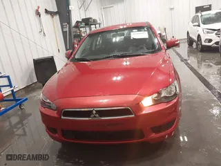 2015 Mitsubishi Lancer ES with VIN JA32U2FU0FU014418, listed as a IAAI auction lot 41489892 with 55,599 mi miles. Bid and sale history available at carsss.com. Image 12.