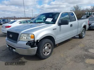 2006 Ford F-150 XL with VIN 1FTPX12V96FB66189, listed as a IAAI auction lot 41737302 with 164,752 mi miles. Bid and sale history available at carsss.com. Image 2.