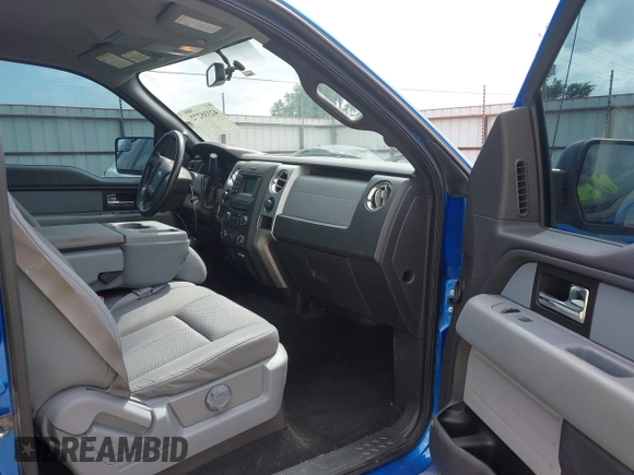 2014 Ford F-150 XL with VIN 1FTFW1CT6EKF05542, listed as a IAAI auction lot 42335272 with 169,985 mi miles and . Bid and sale history available at DreamBid. Image 5.