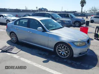 2009 BMW 3 Series 328i with VIN WBAPH77509NM27323, listed as a IAAI auction lot 41991774 with 96,217 mi miles. Bid and sale history available at carsss.com. Image 1.