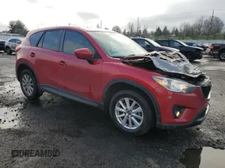2014 Mazda CX-5 Touring с VIN JM3KE2CY3E0308740, выставлен на аукционе Copart как лот 88127365 с пробегом 137 690 миль миль и Списание • Salvage title. История ставок и продаж доступна на DreamBid. Изображение 4.