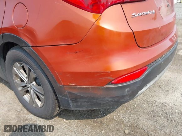2014 Hyundai Santa Fe z VIN 5XYZTDLB0EG208769, wystawiony jako IAAI lot #42485411 z przebiegiem 82 173 mil mil oraz . Historia ofert i sprzedaży dostępna na DreamBid. Obrazek 18.