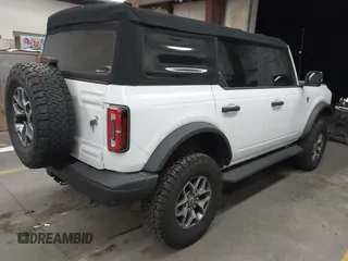 2021 Ford Bronco with VIN 1FMEE5DP2MLA94460, listed as a IAAI auction lot 41615753 with 43,808 mi miles and . Bid and sale history available at DreamBid. Image 4.