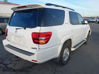 2002 Toyota Sequoia Limited with VIN 5TDZT38A72S112419, listed as a IAAI auction lot 41397980 with 115,947 mi miles. Bid and sale history available at carsss.com. Image 4.