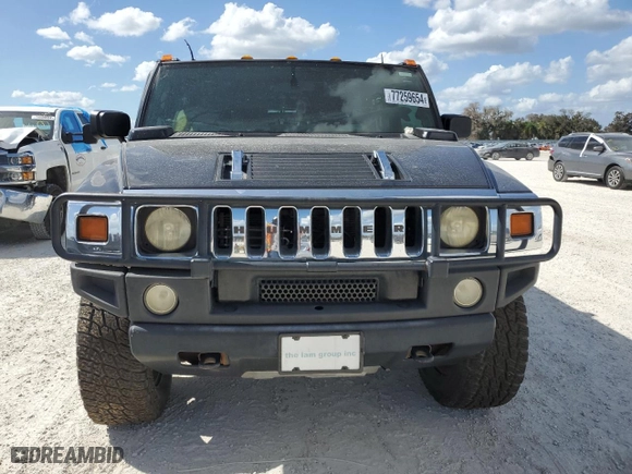 2003 Hummer H2 with VIN 5GRGN23U33H102570, listed as a Copart auction lot 77259654 with 0 mi miles and Salvage Title. Bid and sale history available at carsss.com. Image 5.