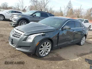 2014 Cadillac ATS Luxury AWD z VIN 1G6AH5RX6E0140302, wystawiony jako IAAI lot #41843454 z przebiegiem 125 388 mil mil oraz . Historia ofert i sprzedaży dostępna na DreamBid. Obrazek 17.