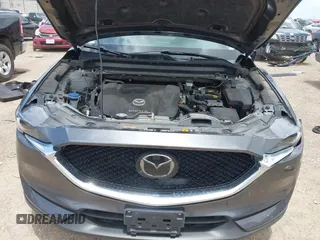 2021 Mazda CX-5 Grand Touring with VIN JM3KFBDM2M0431484, listed as a IAAI auction lot 42547665 with 34,757 mi miles and . Bid and sale history available at DreamBid. Image 10.