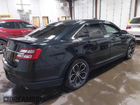 2015 Ford Taurus SHO with VIN 1FAHP2KT6FG137418, listed as a IAAI auction lot 42256452 with 140,335 mi miles and . Bid and sale history available at DreamBid. Image 4.