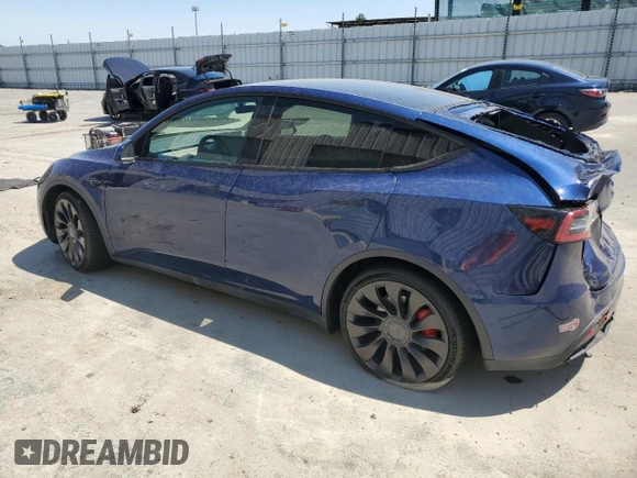 2022 Tesla Model Y Performance with VIN 7SAYGDEF4NF489629, listed as a Copart auction lot 64181775 with 22,120 mi miles and Salvage title. Bid and sale history available at DreamBid. Image 2.