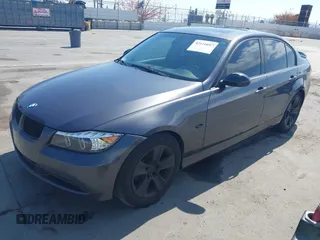 2007 BMW 3 Series 328i with VIN WBAVC53587FZ76498, listed as a IAAI auction lot 42110897 with 178,823 mi miles and . Bid and sale history available at carsss.com. Image 2.