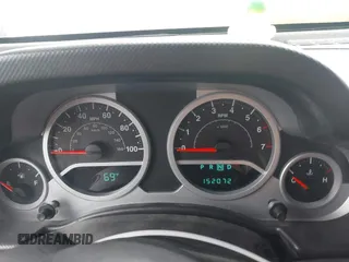 2008 Jeep Wrangler Sahara with VIN 1J4FA54118L653044, listed as a IAAI auction lot 42557244 with 152,072 mi miles and . Bid and sale history available at DreamBid. Image 7.