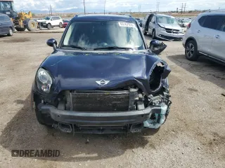 2016 MINI Countryman S with VIN WMWZC3C59GWT08439, listed as a Copart auction lot 65167955 with 76,336 mi miles and Salvage title. Bid and sale history available at DreamBid. Image 5.