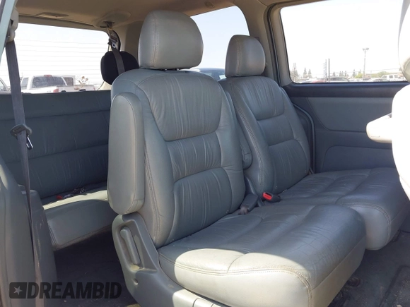 2003 Honda Odyssey EX with VIN 2HKRL18603H502236, listed as a IAAI auction lot 41929501 with 287,538 mi miles and . Bid and sale history available at DreamBid. Image 8.