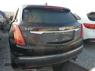 2022 Cadillac XT5 FWD Luxury z VIN 1GYKNAR47NZ100986, wystawiony jako Copart lot #83144574 z przebiegiem Nie podano mil oraz Nie do naprawy • Non repairable. Historia ofert i sprzedaży dostępna na DreamBid. Obrazek 6.