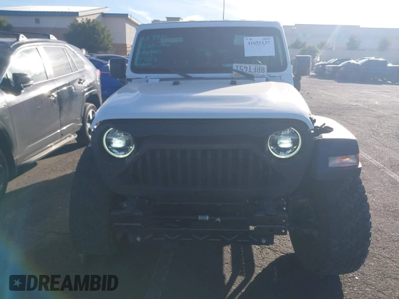 2020 Jeep Wrangler Unlimited Sport S z VIN 1C4HJXDG7LW201699, wystawiony jako IAAI lot #41651137 z przebiegiem 66 777 mil mil oraz . Historia ofert i sprzedaży dostępna na DreamBid. Obrazek 13.