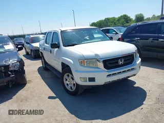 2010 Honda Ridgeline RT with VIN 5FPYK1F27AB003127, listed as a IAAI auction lot 42667927 with 87,654 mi miles and . Bid and sale history available at DreamBid. Image 1.
