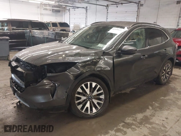 2020 Ford Escape Titanium with VIN 1FMCU9J95LUA39338, listed as a IAAI auction lot 42319122 with 34,631 mi miles and . Bid and sale history available at DreamBid. Image 18.