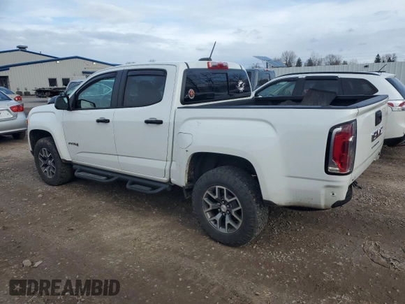 2021 GMC Canyon 4WD AT4 w/Leather with VIN 1GTG6FEN0M1100300, listed as a Copart auction lot 82281314 with 60,086 mi miles and Non Repairable. Bid and sale history available at carsss.com. Image 2.