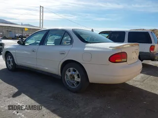 2001 Oldsmobile Intrigue GX z VIN 1G3WH52H11F140740, wystawiony jako IAAI lot #40799284 z przebiegiem 131 940 mil mil oraz . Historia ofert i sprzedaży dostępna na DreamBid. Obrazek 3.