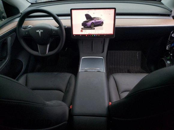2025 Tesla Model Y Long Range z VIN 7SAYGDED9SF269767, wystawiony jako Copart lot #51588985 z przebiegiem 1 943 mil mil oraz Szkoda całkowita • Salvage title. Historia ofert i sprzedaży dostępna na DreamBid. Obrazek 8.