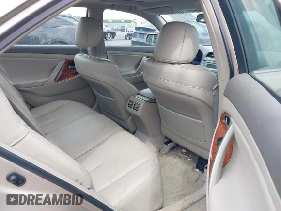 2009 Toyota Camry LE z VIN 4T1BK46KX9U089242, wystawiony jako IAAI lot #42448998 z przebiegiem 252 787 mil mil oraz . Historia ofert i sprzedaży dostępna na DreamBid. Obrazek 8.
