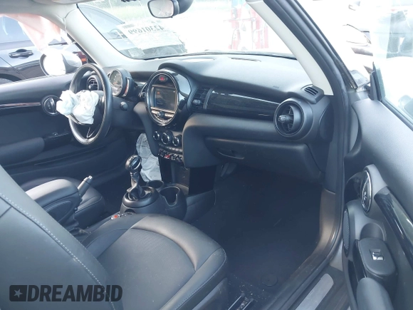 2019 MINI Hardtop Cooper with VIN WMWXP5C57K2H30039, listed as a IAAI auction lot 42301699 with 67,473 mi miles and . Bid and sale history available at DreamBid. Image 5.