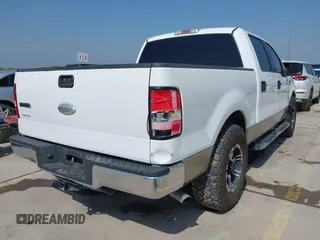 2007 Ford F-150 XLT z VIN 1FTRW12WX7KC53550, wystawiony jako IAAI lot #41909529 z przebiegiem 167 206 mil mil oraz . Historia ofert i sprzedaży dostępna na DreamBid. Obrazek 4.
