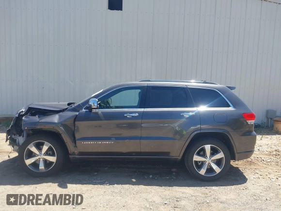2015 Jeep Grand Cherokee Overland with VIN 1C4RJFCG7FC839778, listed as a IAAI auction lot 42490111 with 160,040 mi miles and . Bid and sale history available at DreamBid. Image 15.