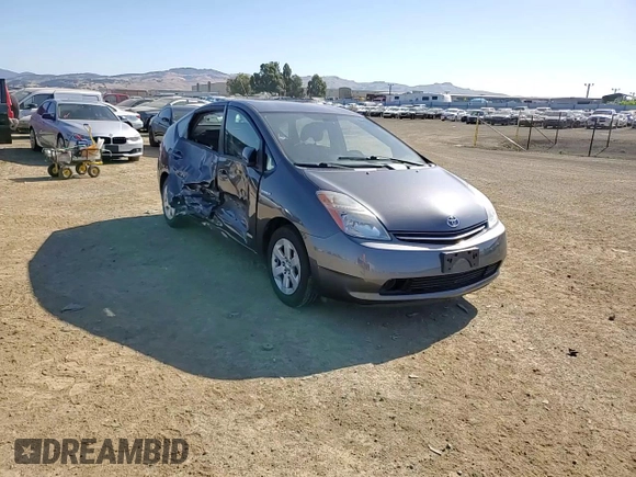 2007 Toyota Prius z VIN JTDKB20U573288978, wystawiony jako Copart lot #57469155 z przebiegiem 170 422 mil mil oraz Szkoda całkowita • Salvage title. Historia ofert i sprzedaży dostępna na DreamBid. Obrazek 13.