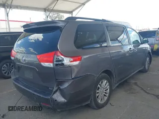 2011 Toyota Sienna XLE AAS with VIN 5TDYK3DC5BS146848, listed as a IAAI auction lot 41914140 with 259,862 mi miles. Bid and sale history available at carsss.com. Image 4.