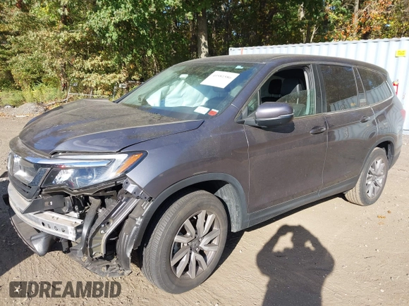 2020 Honda Pilot EX-L z VIN 5FNYF6H53LB069677, wystawiony jako IAAI lot #40581586 z przebiegiem 21 717 mil mil oraz . Historia ofert i sprzedaży dostępna na DreamBid. Obrazek 18.
