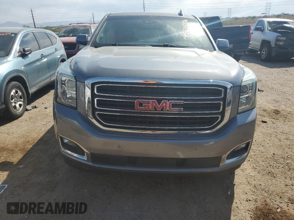 2019 GMC Yukon SLT with VIN 1GKS2BKC5KR310542, listed as a Copart auction lot 75235994 with 20,358 mi miles and Salvage Title. Bid and sale history available at DreamBid. Image 5.