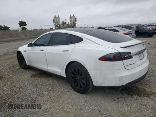 2014 Tesla Model S 60 с VIN 5YJSA1H19EFP52457, выставлен на аукционе Copart как лот 59589905 с пробегом 167 662 миль миль и Списание • Salvage title. История ставок и продаж доступна на DreamBid. Изображение 2.