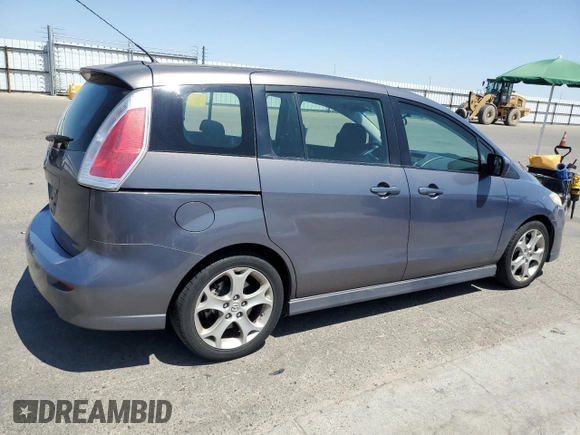 2010 Mazda 5 Sport with VIN JM1CR2WL6A0368572, listed as a Copart auction lot 62604545 with 84,537 mi miles and Salvage title. Bid and sale history available at DreamBid. Image 3.