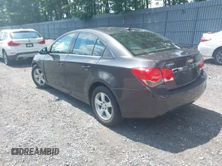 2014 Chevrolet Cruze 1LT with VIN 1G1PC5SB2E7288693, listed as a IAAI auction lot 42728884 with 149,050 mi miles and . Bid and sale history available at DreamBid. Image 3.