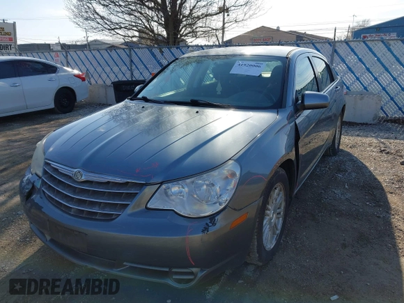 2009 Chrysler Sebring Touring *Ltd Avail* with VIN 1C3LC56BX9N521516, listed as a IAAI auction lot 41920006 with 114,912 mi miles. Bid and sale history available at carsss.com. Image 2.