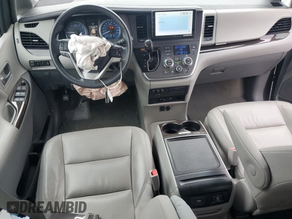 2015 Toyota Sienna XLE с VIN 5TDYK3DC0FS630013, выставлен на аукционе Copart как лот 60044955 с пробегом 124 063 миль миль и Списание • Salvage title. История ставок и продаж доступна на DreamBid. Изображение 8.