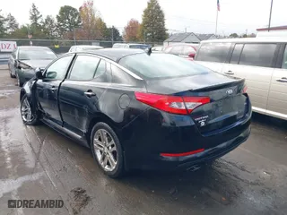 2013 Kia Optima SX w/Limited Pkg with VIN 5XXGR4A6XDG121265, listed as a IAAI auction lot 40771144 with 129,247 mi miles. Bid and sale history available at carsss.com. Image 3.