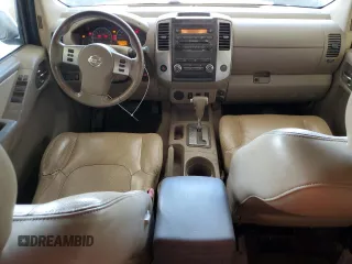 2009 Nissan Frontier LE with VIN 1N6AD09U79C409698, listed as a Copart auction lot 55843545 with 230,334 mi miles and Salvage title. Bid and sale history available at DreamBid. Image 8.