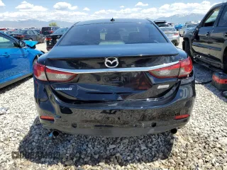 2014 Mazda 6 i Grand Touring с VIN JM1GJ1W61E1146244, выставлен на аукционе Copart как лот 57856365 с пробегом 152 194 миль миль и Списание • Salvage title. История ставок и продаж доступна на DreamBid. Изображение 6.