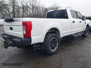 2017 Ford Super Duty F-250 SRW Lariat with VIN 1FT7W2BT5HEC76818, listed as a IAAI auction lot 40882791 with 173,973 mi miles. Bid and sale history available at carsss.com. Image 4.
