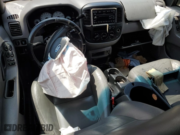 2002 Ford Escape XLT Choice с VIN 1FMYU03152KC71778, выставлен на аукционе Copart как лот 61072285 с пробегом Не указан миль и Списание • Salvage title. История ставок и продаж доступна на DreamBid. Изображение 8.