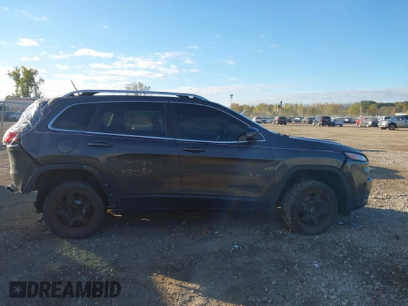 2015 Jeep Cherokee Limited with VIN 1C4PJMDS4FW659798, listed as a IAAI auction lot 40482812 with 65,453 mi miles. Bid and sale history available at carsss.com. Image 13.