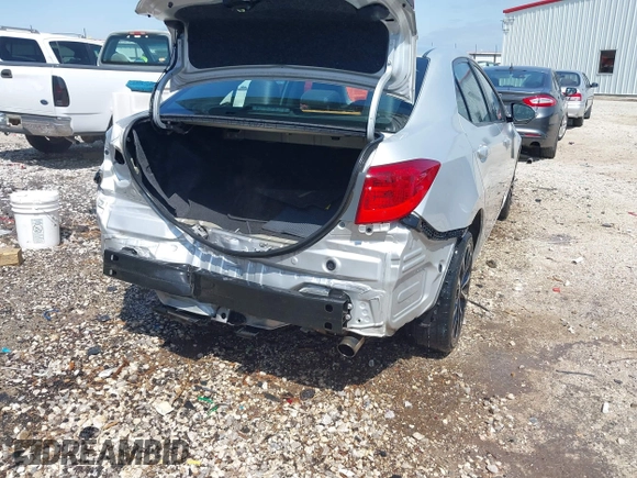 2019 Toyota Corolla L with VIN 5YFBURHE3KP892528, listed as a IAAI auction lot 41912008 with 106,251 mi miles and . Bid and sale history available at DreamBid. Image 4.
