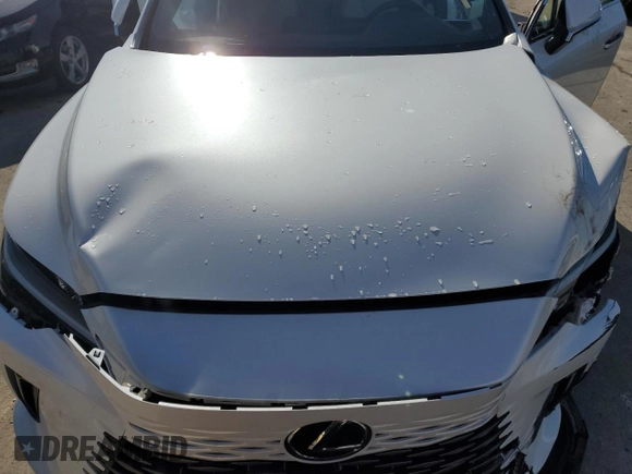 2024 Lexus RX 350 z VIN JTJCHMAA6R2016769, wystawiony jako Copart lot #87454404 z przebiegiem 16 804 mil mil oraz Szkoda całkowita • Salvage title. Historia ofert i sprzedaży dostępna na DreamBid. Obrazek 13.