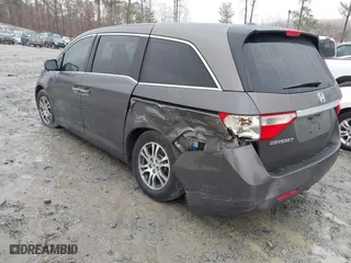 2011 Honda Odyssey EX-L with VIN 5FNRL5H6XBB100535, listed as a IAAI auction lot 41544196 with 261,000 mi miles. Bid and sale history available at carsss.com. Image 3.