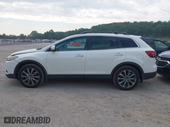 2015 Mazda CX-9 Grand Touring with VIN JM3TB2DA7F0448886, listed as a IAAI auction lot 42440203 with 108,765 mi miles and . Bid and sale history available at DreamBid. Image 14.